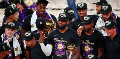 Oct 11, 2020; Lake Buena Vista, Florida, USA; Los Angeles Lakers forward LeBron James (23) holds up four fingers after winning his fourth NBA championship after game six of the 2020 NBA Finals at AdventHealth Arena. The Los Angeles Lakers won 106-93 to win the series. Mandatory Credit: Kim Klement-USA TODAY Sports,Oct 11, 2020; Lake Buena Vista, Florida, USA; Los Angeles Lakers forward LeBron James (23) holds up four fingers after winning his fourth NBA championship after game six of the 2020 NBA Finals at AdventHealth Arena. The Los Angeles Lakers won 106-93 to win the series. Mandatory Credit: Kim Klement-USA TODAY Sports