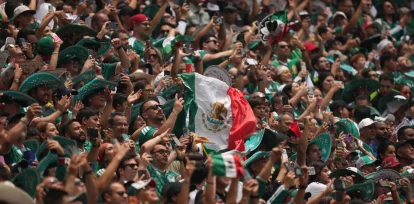 Los aficionados mexicanos celebran