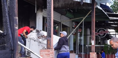 Daños incendio frente a la UASD