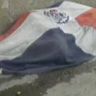 Haitiana se arropa con bandera dominicana