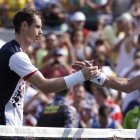 Andy Murray, of England, shakes hands with Juan Monaco, of Argentina, after their match at the 2016 Summer Olympics in Rio de Janeiro, Brazil, Tuesday, Aug. 9, 2016. Murray defeated Monaco 6-3, 5-1.(AP Photo/Charles Krupa)