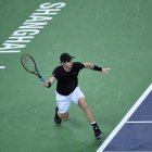 Andy Murray of Britain hits a return against David Goffin of Belgium during their men's singles match at the Shanghai Masters tennis tournament in Shanghai on October 14, 2016. / AFP / WANG ZHAO