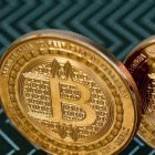(FILES) This file photo taken on June 17, 2014 shows bitcoin medals in Washington, DC. US prosecutors have charged a New York woman with using Bitcoin and other crypto-currencies to send funds to the Islamic State group. Zoobia Shahnaz, 27, was arrested at her Long Island home on December 14, 2017 for sending over $150,000 through shell accounts in China, Pakistan and Turkey to benefit IS extremists.
 / AFP / KAREN BLEIER