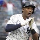 New York Yankees' Miguel Andujar reacts as he rounds the bases after hitting a two-run home run during the seventh inning of a baseball game against the Texas Rangers Saturday, Aug. 11, 2018, at Yankee Stadium in New York. (AP Photo/Bill Kostroun)