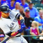 New York Yankees' Gary Sanchez hits a two-run single off Texas Rangers' Martin Perez during the second inning of a baseball game, Friday, Sept. 8, 2017, in Arlington, Texas. (AP Photo/Tony Gutierrez)