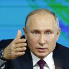 Russian President Vladimir gestures during his annual news conference in Moscow, Russia, Thursday, Dec. 20, 2018. Speaking at news conference Thursday, Putin pointed at the U.S. intention to withdraw from the 1987 Intermediate-Range Nuclear Forces (INF) Treaty. He said that if the U.S. puts intermediate-range missiles in Europe, Russia will be forced to take countermeasures. (AP Photo/Alexander Zemlianichenko)