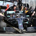 Technicians for Mercedes driver Lewis Hamilton of Britain pratcice a tire change during the second practice session of the Australian Grand Prix in Melbourne, Australia, Friday, March 15, 2019. The first race of the year is Sunday. (AP Photo/Andy Brownbill)