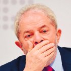 (FILES) In this file photo taken on April 24, 2017 former Brazilian President (2003-2010) Luiz Inacio Lula da Silva gestures while delivering a speech at a seminar on "Strategies for the Brazilian Economy" promoted by the Workers' Party in Brasilia. Brazil's former president and current election frontrunner Luiz Inacio Lula da Silva looked increasingly likely to face prison on April 04, 2018  after five out of eleven judges of the divided Supreme Court voted against allowing him to delay a sentence for corruption. / AFP / EVARISTO SA