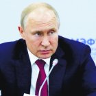 Russian President Vladimir Putin gestures as attends a meeting with heads of foreign companies at the St. Petersburg International Economic Forum in St. Petersburg, Russia, Friday, June 7, 2019. (Yuri Kochetkov/Pool Photo via AP)