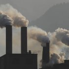 DOCU_GRUPO Smoke billows from a cement plant on the outskirts of Baokang