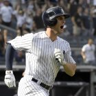 New York Yankees pinch-hitter Greg Bird reacts as he flies out to deep right field with the bases loaded to end the eighth inning of a baseball game against the Detroit Tigers Sunday, Sept. 2, 2018, at Yankee Stadium in New York. The Tigers won 11-7. (AP Photo/Bill Kostroun)