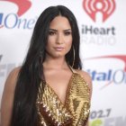 En esta foto del 1 de diciembre del 2017, Demi Lovato llega al concierto Jingle Ball en The Forum en Inglewood, California. Lovato cantará el himno nacional en el Super Bowl el 2 de febrero del 2020 en Miami, anunciaron el jueves la NFL y Fox. Jennifer López y Shakira encabezarán el espectáculo del medio tiempo. (Foto por Richard Shotwell/Invision/AP, Archivo)
