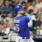 HOUSTON, TX - JUNE 25:  Randal Grichuk #15 of the Toronto Blue Jays hits a two-run home run in the eighth inning against the Houston Astros at Minute Maid Park on June 25, 2018 in Houston, Texas.  (Photo by Bob Levey/Getty Images)