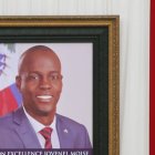 People put their names into a signature book during a ceremony in honor of late Haitian President Jovenel Moise at the National Pantheon Museum in Port-au-Prince, Haiti, Tuesday, July 20, 2021. Moise was assassinated on July 7 at his home. (AP Photo/Joseph Odelyn)