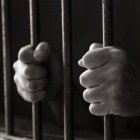 Hombre en prisión. Archivo