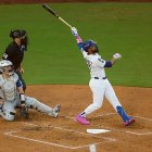 LOS ANGELES, CALIFORNIA - OCTOBER 27: Teoscar Hernandez #37 of the Los Angeles Dodgers hits a home run against the Toronto Blue Jays during the second inning in game three of the 2025 World Series at Dodger Stadium on October 27, 2025 in Los Angeles, California. (Photo by Harry How/Getty Images)
