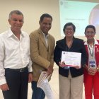 De izquierda a derecha, el director de la Escuela de Mercadotecnia, UASD, maestro José Burgos, la maestra Hilda Feliz y la maestra Aldelys Rodriguez, directora Escuela de Administración , UASDl