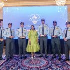 Galardonados de Comipol junto a Xiomara Guante.