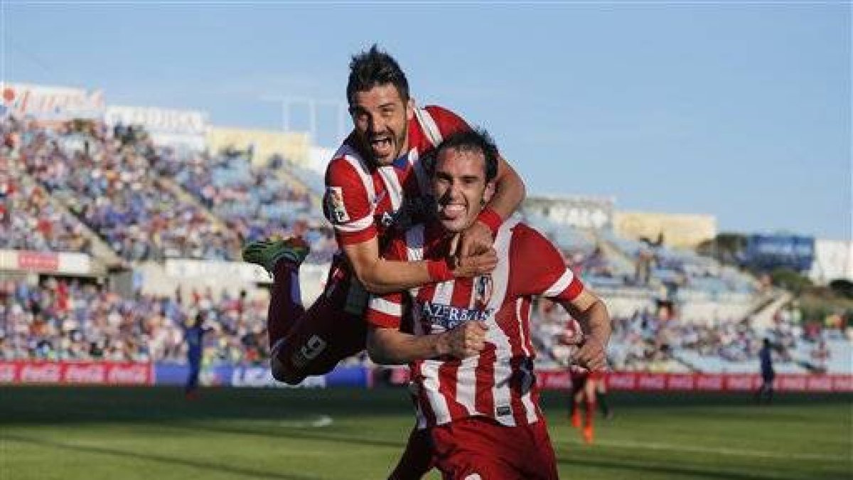 Diego Godin, David Villa