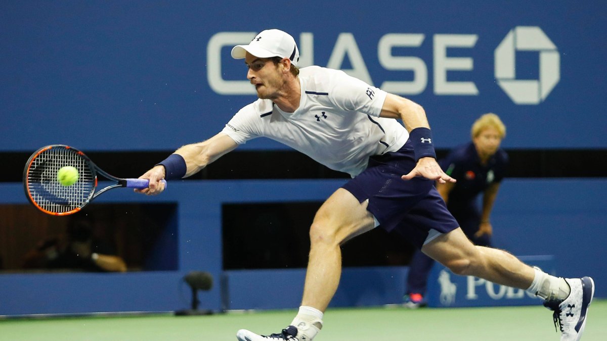 Andy Murray of Great Britain hits a return against Marcel Granollers of Spain during their 2016 US Open Men's Singles match at the USTA Billie Jean King National Tennis Center in New York on September 1, 2016. Murray beat Granollers 6-4, 6-1, 6-4. / AFP / EDUARDO MUNOZ ALVAREZ