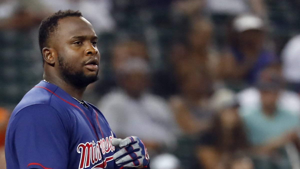 FILE - In this Sept. 18, 2018, file photo, Minnesota Twins' Miguel Sano tosses his helmet after being called out on strikes in the fourth inning of a baseball game against the Detroit Tigers in Detroit. Sano will likely miss the first month of the season, following another procedure to repair a severe cut above the heel on his right foot. Twins chief baseball officer Derek Falvey said Tuesday, March 5, 2019. (AP Photo/Paul Sancya, File)