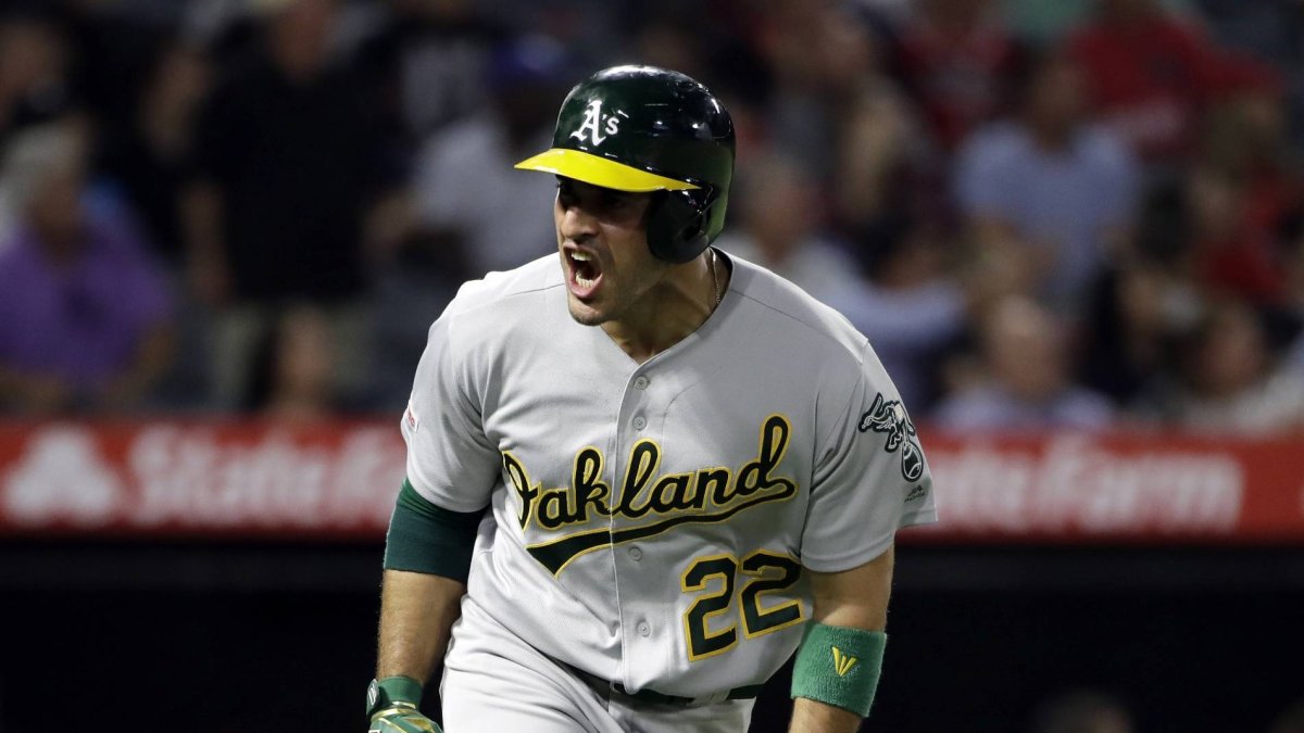 Oakland Athletics' Ramon Laureano celebrates as he runs toward first after hitting a solo home run during the fifth inning of the team's baseball game against the Los Angeles Angels on Wednesday, Sept. 25, 2019, in Anaheim, Calif. (AP Photo/Marcio Jose Sanchez)