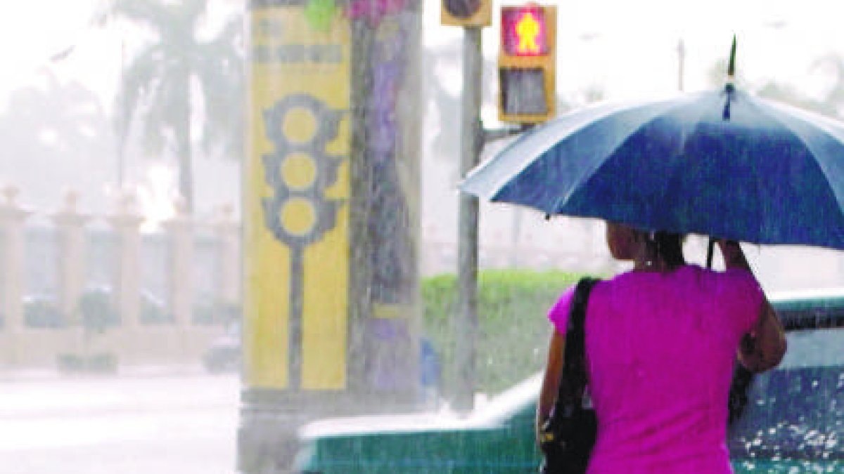 País - Lluvia sobre la ciudad de Santo Domigo.
Ariel Díaz-Alejo / Periódico Hoy / 08 de diciembre del 2009.