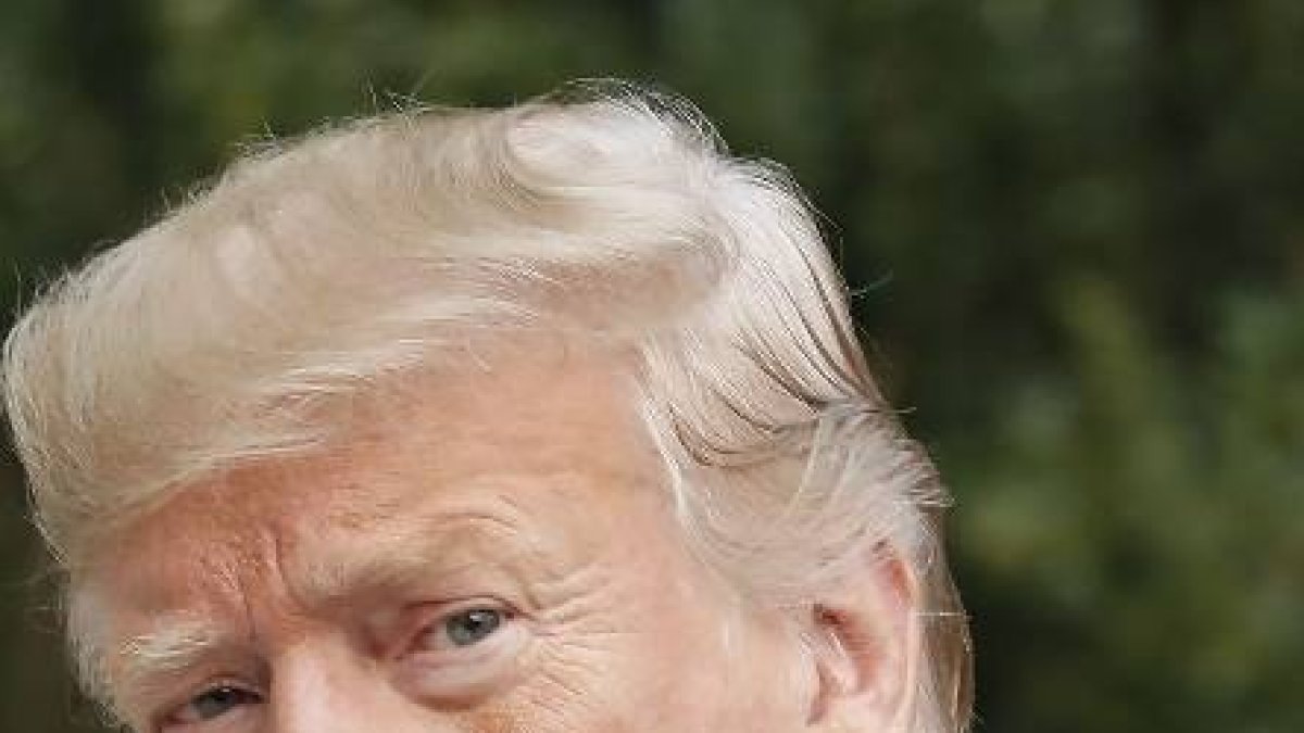 President Donald Trump gives a 'thumbs-up' towards members of the media on the South Lawn of the White House in Washington, Thursday, Oct. 3, 2019, after his return from Florida. (AP Photo/Pablo Martinez Monsivais)