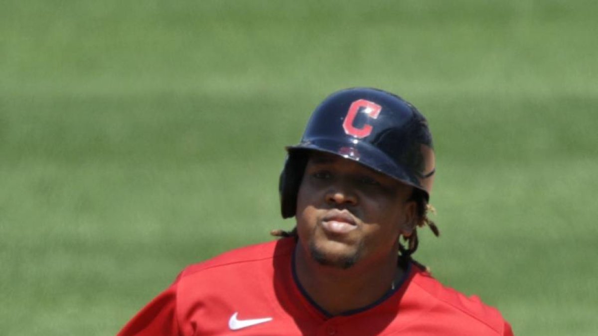 Cleveland Indians' Jose Ramirez runs the bases after hitting a three-run home run in the fourth inning in a baseball game against the Kansas City Royals, Sunday, July 26, 2020, in Cleveland. (AP Photo/Tony Dejak)