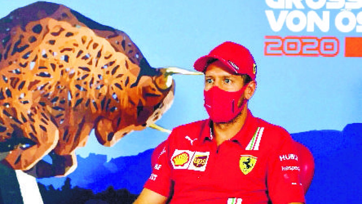 Ferrari driver Sebastian Vettel of Germany speaks during drivers news conference the at the Red Bull Ring racetrack in Spielberg in Spielberg, Austria, Thursday, July 2, 2020. Austrian Formula One Grand Prix will be held on Sunday. (Mark Sutton/Pool via AP)