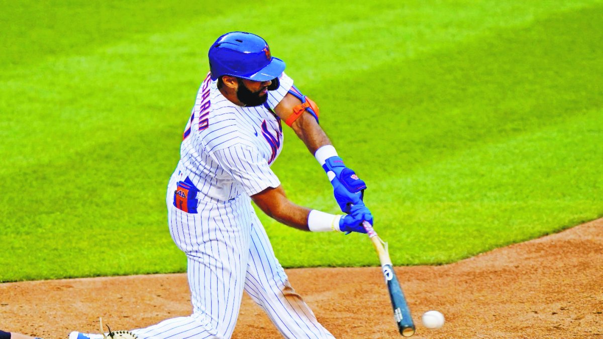New York Mets' Amed Rosario breaks hit bat as he connects for an infield single during the fourth inning of a makeup baseball game against the New York Yankees at Citi Field, Thursday, Sept. 3, 2020, in New York. (AP Photo/Kathy Willens)