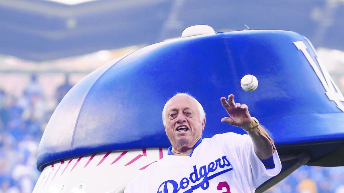 Los Angeles (United States).- (FILE) - Los Angeles Dodgers great Tommy Lasorda throws out the ceremonial first pitch before the start of game three of the World Series between the Boston Red Sox and the Los Angeles Dodgers at Dodger Stadium in Los Angeles, California, USA, 26 October 2018 (reissued 08 January 2021). Dodgers hall of famer Tommy Lasorda has died at the age of 93, the Los Angeles Dodgers on 08 January 2021 announced. (Estados Unidos) EFE/EPA/EUGENE GARCIA *** Local Caption *** 54730794