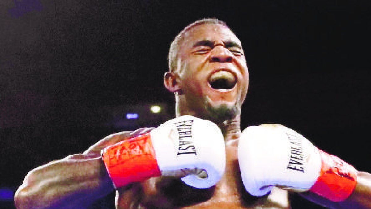 Dominican Republic's Carlos Adames, right, reacts after beating Frank Galarza in a super welterweight championship boxing match Saturday, April 20, 2019, in New York. Adames stopped Galarza in the fourth round. (AP Photo/Frank Franklin II)