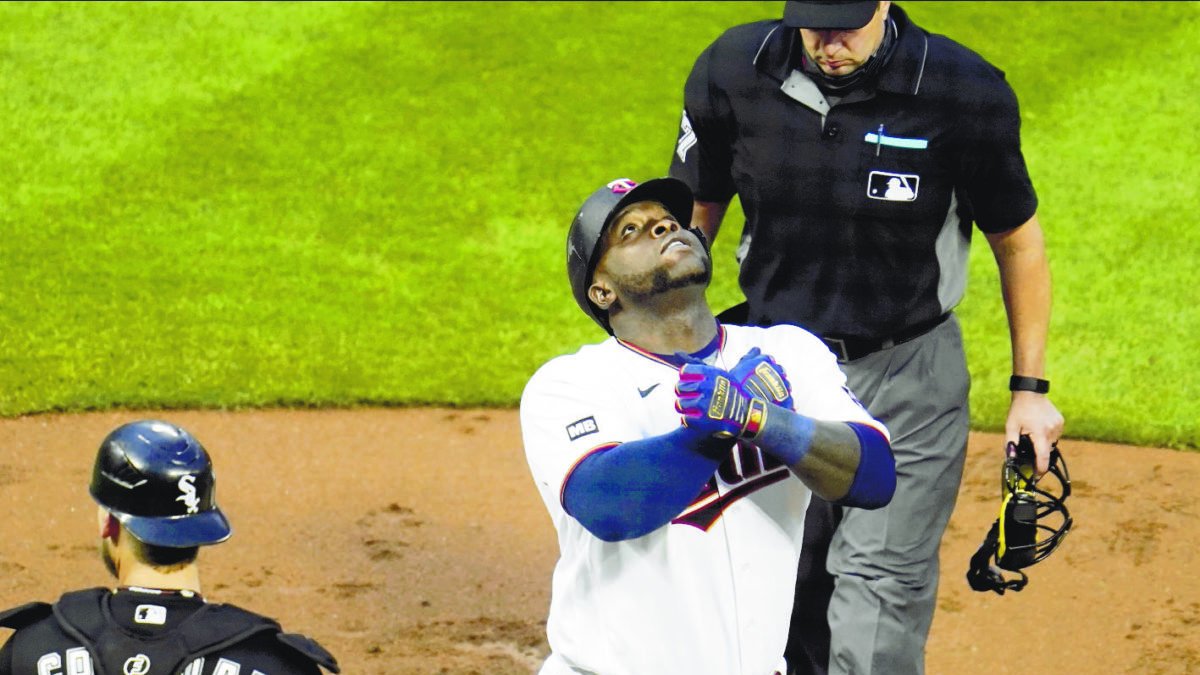Minnesota Twins' Miguel Sano celebrates his solo home run in the fourth inning of a baseball game Tuesday, May 18, 2021, in Minneapolis. (AP Photo/Jim Mone)