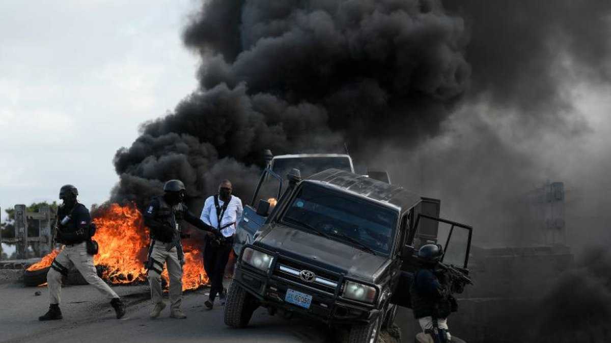 Los manifestantes protestan para pedir justicia por la muerte de Moise.