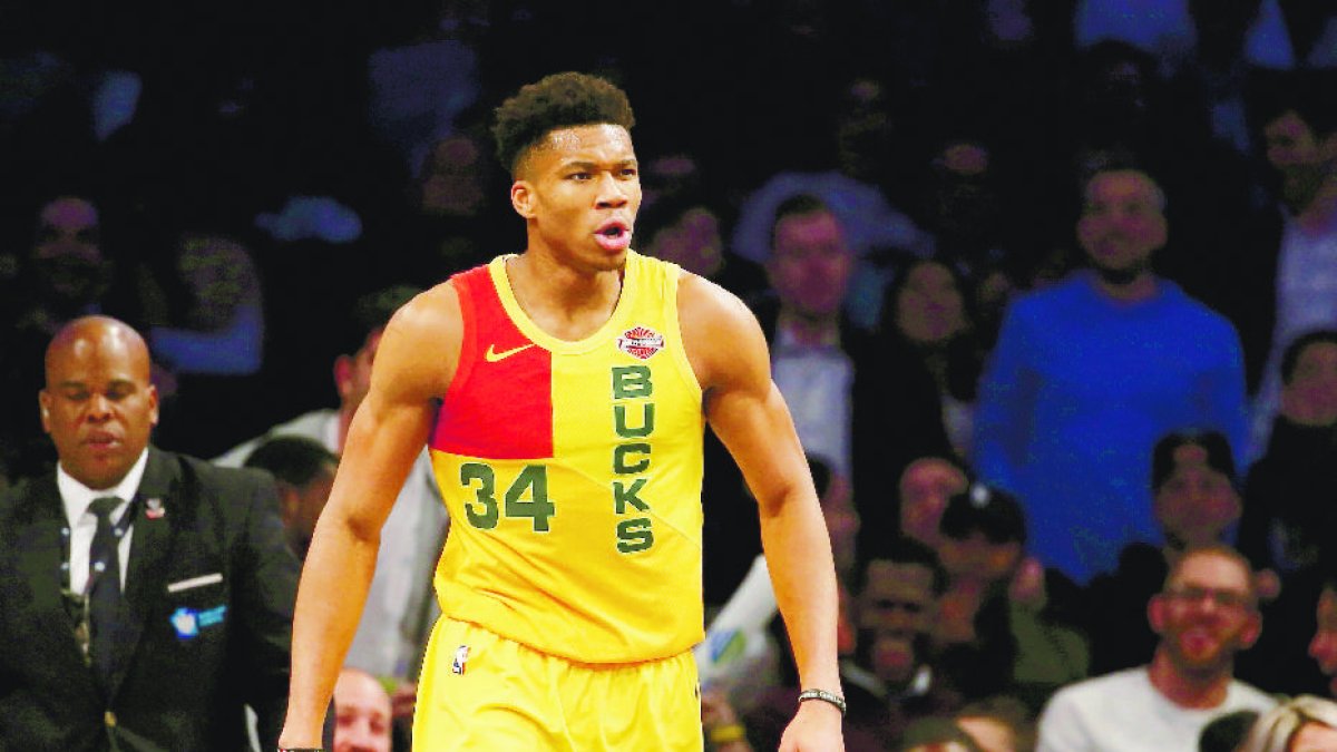 Milwaukee Bucks forward Giannis Antetokounmpo reacts during the first half of an NBA basketball game against the Brooklyn Nets, Monday, April 1, 2019, in New York. (AP Photo/Michael Owens)