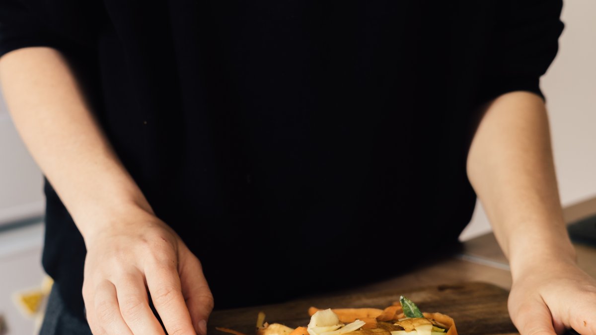 Millennial,Young,Woman,Recycling,Compost,From,Kitchen,Waste.,Circular,Economy,