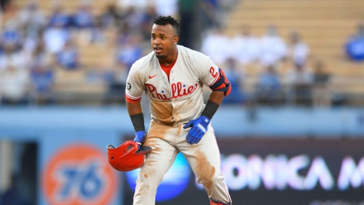 LOS ANGELES, CA - JUNE 14: Jean Segura (2) of the Philadelphia Phillies is safe at second base while playing the Los Angeles Dodgers on June 14, 2021 at Dodger Stadium in Los Angeles, CA. (Photo by John McCoy/Icon Sportswire via Getty Images)