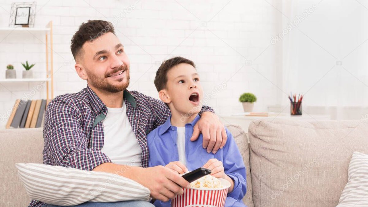 depositphotos_313355680-stock-photo-dad-and-son-enjoying-tv