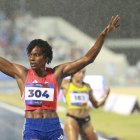 Marileidy Paulino de República Dominicana celebra en la final de 400 metros femenino este miércoles, en los XXV Juegos Centroamericanos y del Caribe Santo Domingo 2026 en Santo Domingo (República Dominicana). EFE/ Orlando Barría