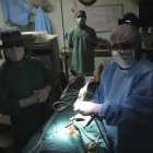 Indian doctor B.P Tyagi performs extended functional endoscopic sinus surgery on a person suffering from mucormycosis at a hospital in Ghaziabad, outskirts of New Delhi, India, Sunday, May 23, 2021. Several cases of the black fungus infection is being reported in patients recovering from COVID-19 in many parts of India. (AP Photo/Amit Sharma)