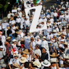 Personas participan en una protesta este sábado, en la ciudad de Guadalajara (México).