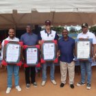 Johancel Montero (iz), Bienvenido Carmona Jr., Augusto Martínez, Melvin José Bejarán, Rafael Báez, contralmirante Wilson Heredia Santos y Juan Morales.